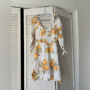 For Love and Lemons mini dress with tie shoulders and tie sleeves lemon print